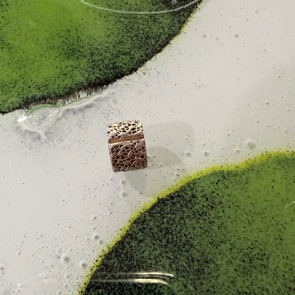 Pandora charm.